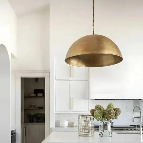 Brass dome, white kitchen