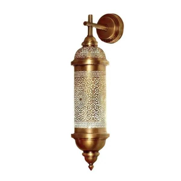 Cylindrical Wall Sconce - Engraved brass cylinder, mounted flush to the wall.