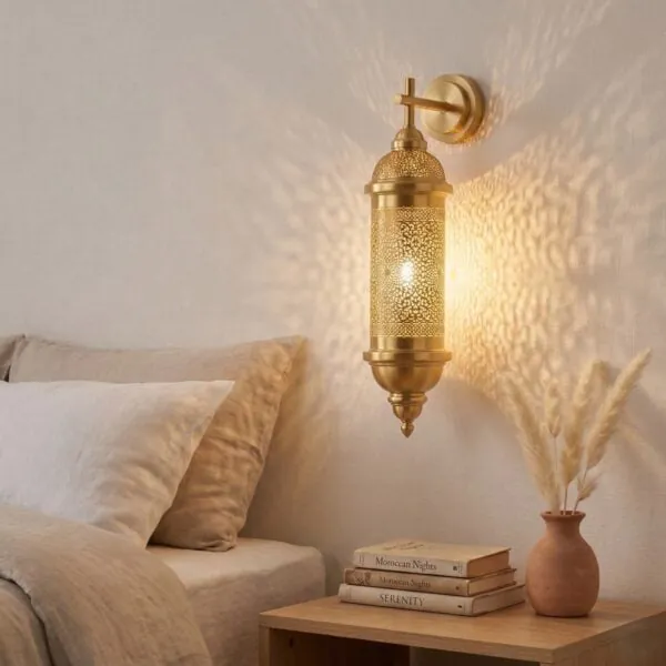 Filigree Openwork Sconce - Dense pierced openwork across a rounded sconce face.