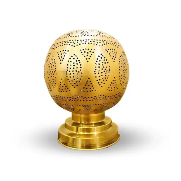Globe Bedside Lamp - Compact engraved sphere, sized for a nightstand.