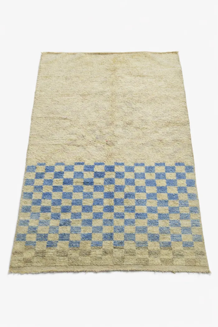Custom-Dyed Checkerboard - Plain ivory meeting a blue checkerboard half.