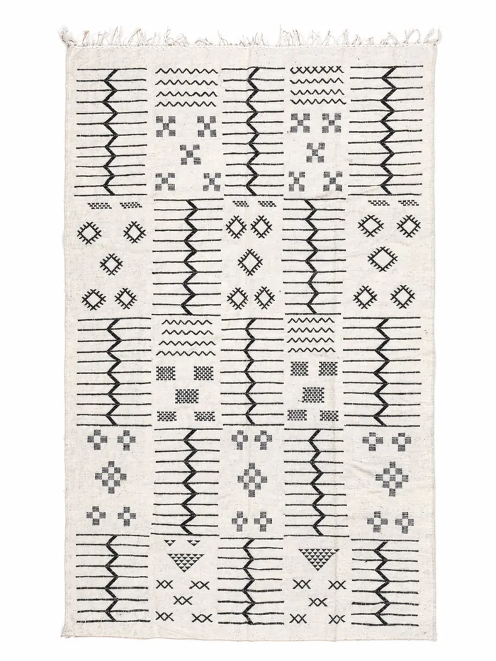 Ivory Symbol Rows - Rows of hand-tied Amazigh symbols on an ivory ground.
